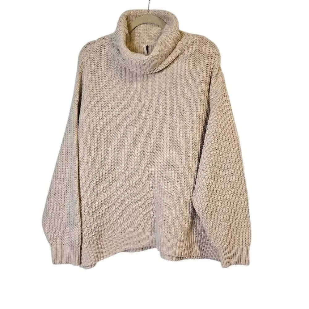 Free People cream turtleneck sweater. Size M/L. #876